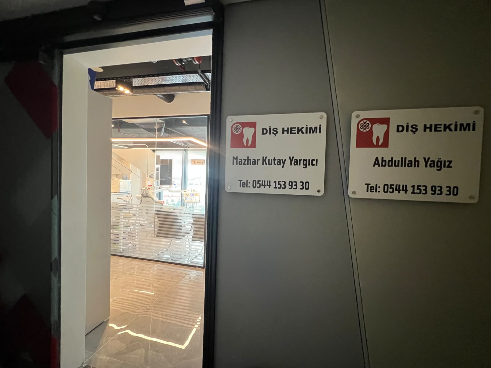 Clinic entrance with doctors' name plates